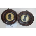 A pair of 19th century circular portrait silhouettes, one inscribed on old label verso 'John Menke',