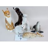 Six Russian Lomonosov animal figures, stoat, seal, polar bear, otter,