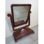 A Victorian mahogany toilet mirror on a pedestal base in clean condition est: £30-£50