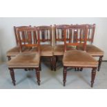 A set of six Victorian mahogany framed and carved dining chairs,