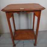 A 20c oak side table with lower shelf in clean condition est: £20-£40