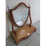 A 19c mahogany shield shaped toilet mirror with three small drawers to base and mother of pearl