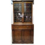 A 19th century mahogany secretaire bookcase with double glazed doors to top,