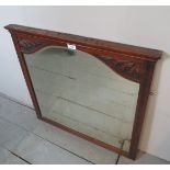 An Edwardian walnut framed mirror est: £20-£30