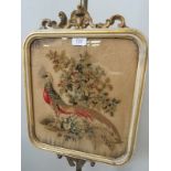 A Regency painted pole screen with original needlework panel,