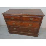 An Edwardian mahogany chest of two short over two long drawers with brass handles est: £30-£50