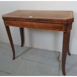 A fine Regency inlaid rosewood turn over card table with green baize,