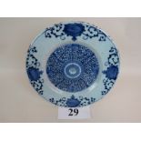 An 18th century Delft plate, typical blue painted tin glaze,