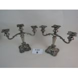 A pair of period-style silver plated candelabra,