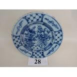 An 18th century Delft plate, typical blue painted tin glaze,