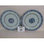 A pair of 18th century Chinese porcelain plates, with painted and incised decoration,