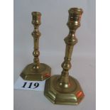 A pair of 18th century brass candlestick