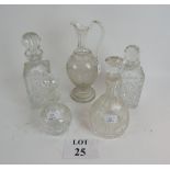 A collection of four excellent quality decanters 19th and 20th century and a 19th century glass jug