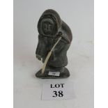 A carved stone figure of an Inuit est: £30-£50