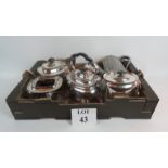 A box of silver plated items to include a large tray, coffee pot,