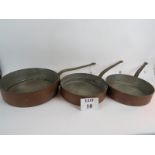 Three large 19th century copper shallow pans est: £80-£120