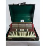 A cased Hohner Tango III M accordion est: £50-£100