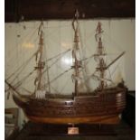 A large and intricate scratch built wooden model of the HMS Victory,