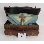 Two leather cases of Masonic aprons,