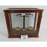 A cased set of balance scales and weights est: £30-£50