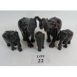 A collection of five carved elephants est: £30-£50