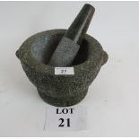 A stone pestle and mortar est: £40-£60