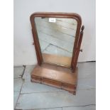 A 19th century mahogany toilet mirror with three small drawers to base est: £30-£50