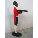 A c1920 dumb waiter visiting card stand, modelled as a butler,