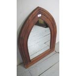 A 20th century arched wall mirror bearing label 'Handmade in Bali' est: £15-£25