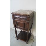 A 19th century marble topped pot cupboard with a single drawer over a panelled cupboard door and a