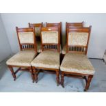 A set of six oak framed Edwardian dining chairs,