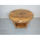 A pretty Art Deco walnut coffee table, with a quarter veneered top,