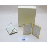 A silver gilt double photo frame, approx