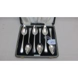 A set of six silver grapefruit spoons, B