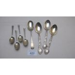 Three sterling embossed spoons, a set of