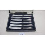 A set of six silver handled tea knives,