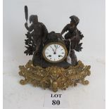 A 19th century French mantel clock, gild