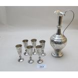 A Russian silver engraved ewer and six s