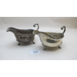 A pair of silver sauce boats with acanth