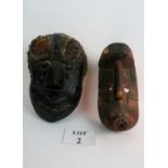 Two old African tribal masks, most likel