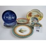 An assortment of vintage china plates to