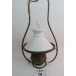 A hanging oil lamp now converted to elec