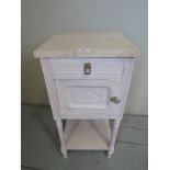 A Victorian painted bedside cabinet with