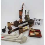 A collection of antique and vintage pipe