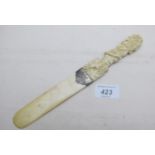 A carved bone and ivory paper knife est: