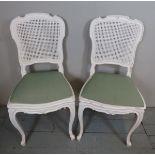 A pair of C1900 French painted and cane
