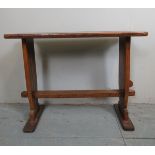 A small 20th Century oak side table in t