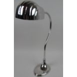 A silver plated desk lamp with shell sha