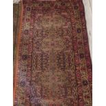 A 20th century Persian rug with central