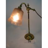 A stylish vintage brass desk lamp, adjustable arm, moulded glass shade,
